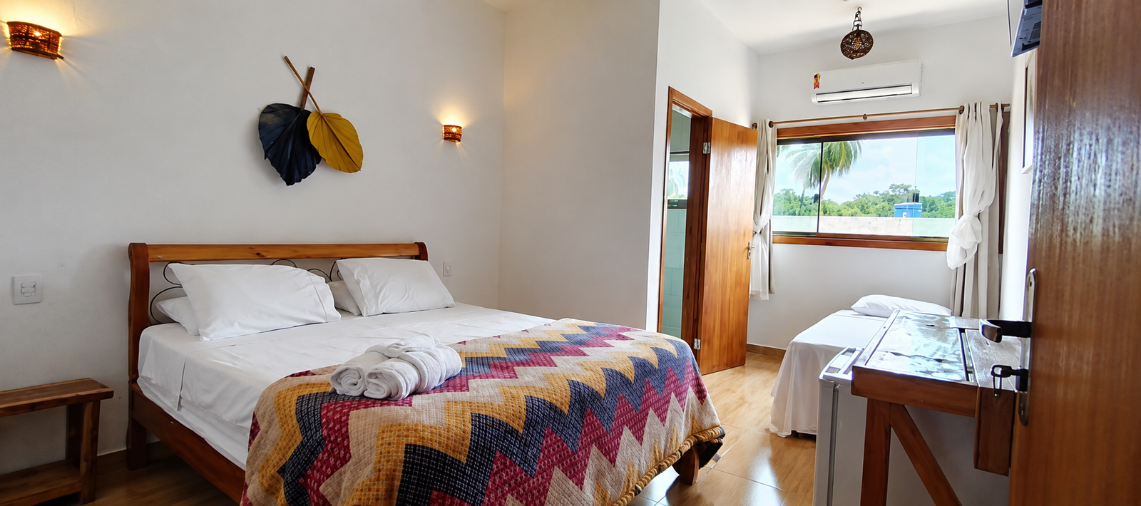 Suite standard com cama de casal e cama auxiliar
